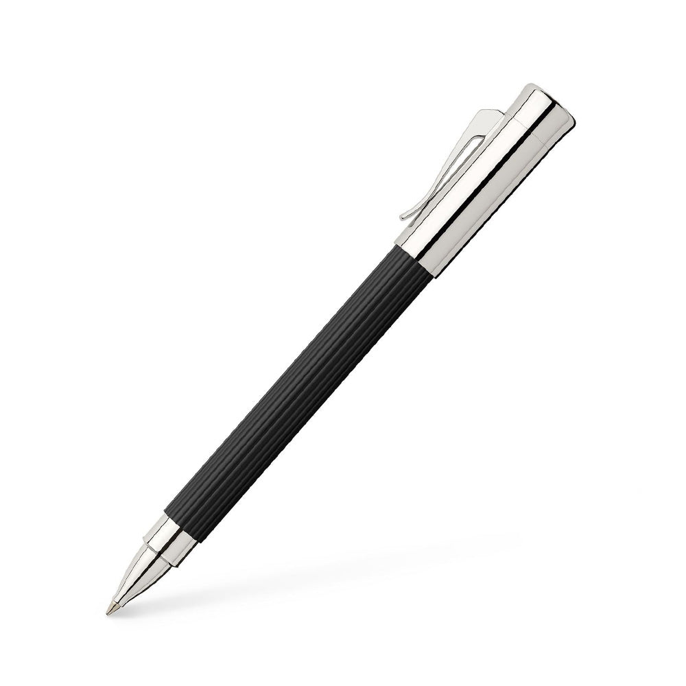 Rollerball pen Tamitio Black Our series „Tamitio“ shows how the culture of writing can be enriched with extraordinary nuances. Each of the slender writing implements is the expression of pure elegance and therefore both, eye-catcher and stylish accessory, together. Matt lacquered metal barrel, finely fluted, Black Chrome-plated, highly polished metal parts Solid, spring-loaded Clip Excellent, smooth- running precision point Fast-drying ink, black Line width B Document- proof Elegant gift box included