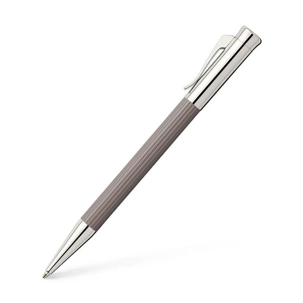 Ballpoint pen Tamitio Taupe Our series „Tamitio“ shows how the culture of writing can be enriched with extraordinary nuances. Each of the slender writing implements is the expression of pure elegance and therefore both, eye-catcher and stylish accessory, together. Matt lacquered metal barrel, finely fluted, Taupe Chrome-plated, highly polished metal parts Solid, spring-loaded Clip Black, large capacity refill in international standard size Line width B Document-proof Elegant gift box included