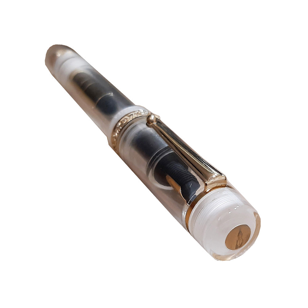Delta Dolcevita IT Mid-Size Transparent Resin with Gold Trim Fountain Pen – 14Kt Gold Nib
