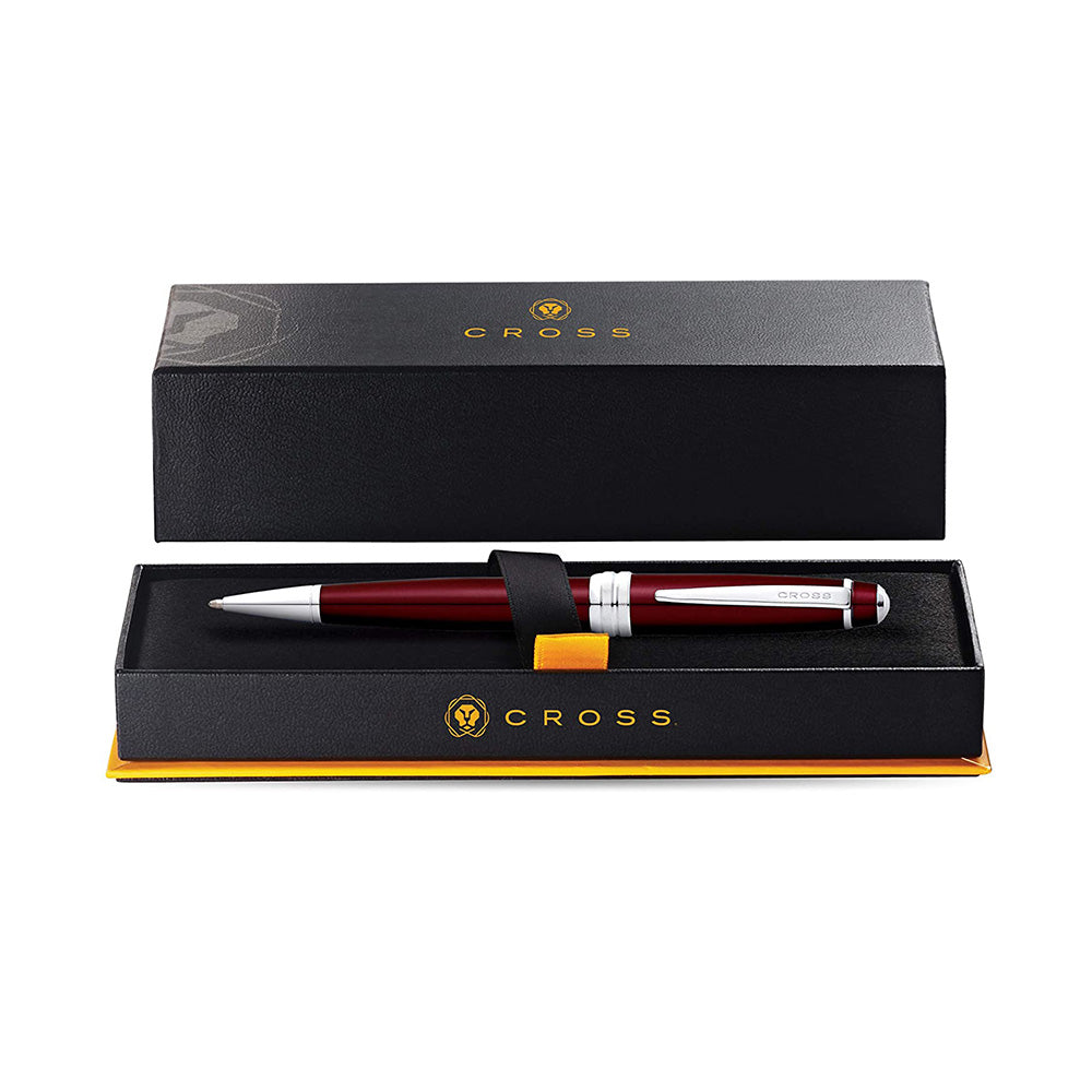 Bailey was designed with an eye for detail. From its multi-grooved chrome center ring with patterned engravings to its sleek, modern clip, it exudes a distinct style that's sure to be noticed. Bailey Lacquer Traditional, well-balanced design Distinctive cap-over-barrel styling Multi-groove center ring with a deep-cut engraving Rich Red Lacquer finish Chrome-plated appointments Patented twist-action propel/repel feature Includes 1 Black Medium Ballpoint Refill (#8513) in pen. Premium gift box