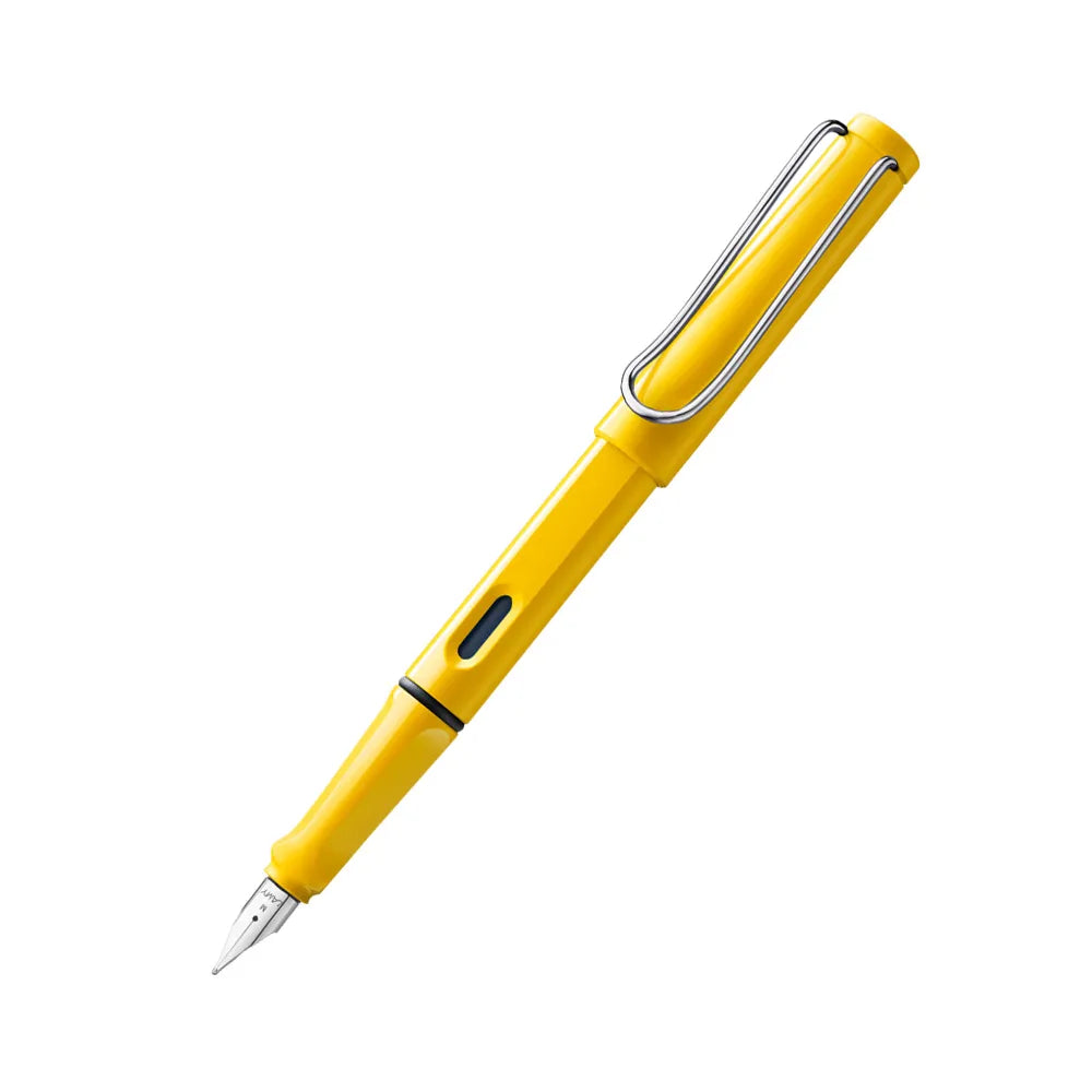 The LAMY safari Many attractive colours, timeless design, perfect ergonomics. These are just some of the reasons that the LAMY safari is one of the most popular writing instruments worldwide. Distinctive recessed grip guarantees writing comfort. Sturdy yellow plastic with metal clip/ ergonomic grip and a black chromium-plated steel nib/ With ink cartridge LAMY T 10 blue/ Can be used with the converter LAMY Z 28. Part No.: 4000217