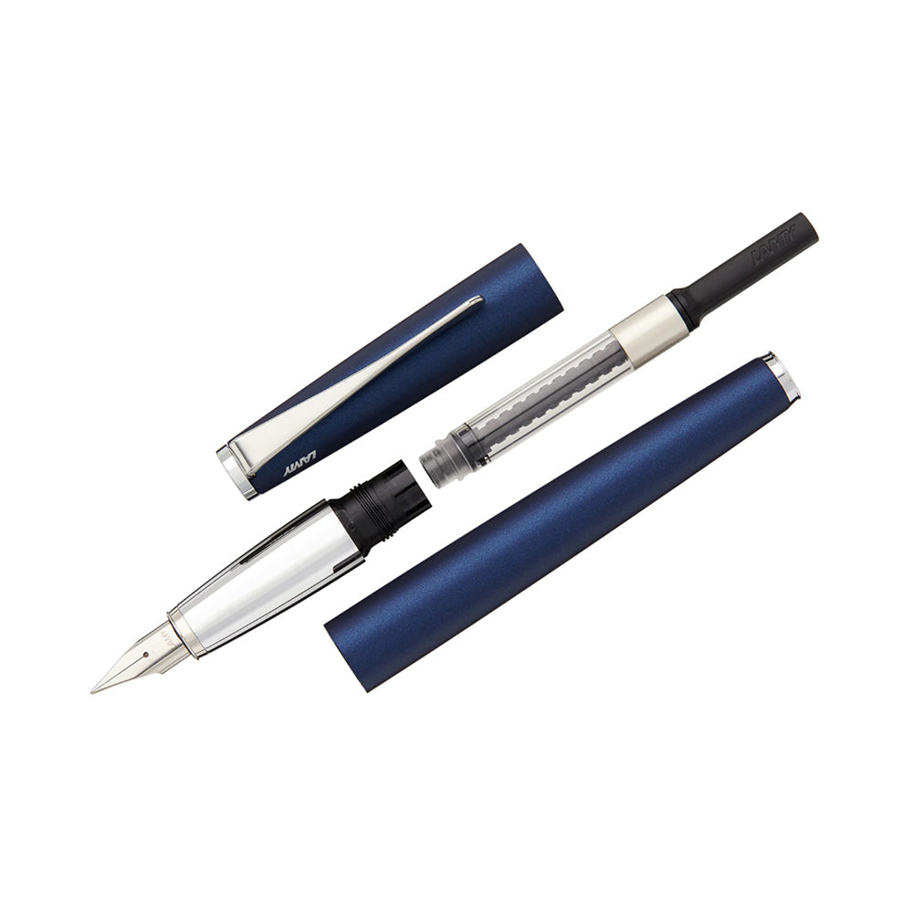 Timeless Perfection. LAMY studio imperialblue Fountain pen M The special elegance of the LAMY studio demonstrates just how close design and art can be. The propeller-shaped clip accents the pen’s innovative form. Matt dark blue lacquer finish / steel propeller-shaped clip / steel nib, polished / Lamy T 10 blue ink cartridge; with converter Z 27