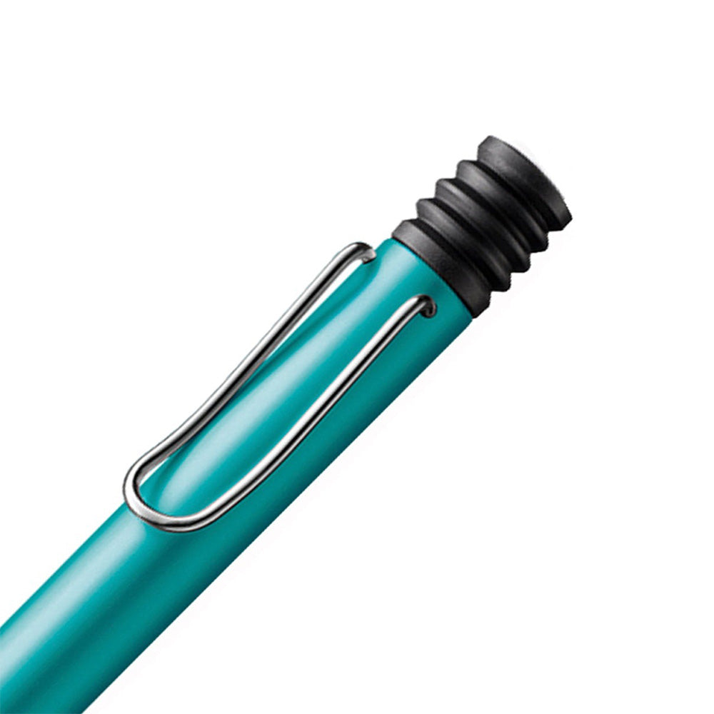 The Lamy AL-Star Ballpoint Pen is the attractive, young writing instrument which satisfies even the highest requirements. Made of feather-light robust aluminium, anodised in various colours. With ergonomic transparent grip and spring-action metal clip. Ballpoint pen comes with LAMY large capacity refill M 16 black. Aluminium, turmaline metallic anodized / metal clip / ergonomic plastic grip / with giant refill LAMY M16 M black Part No. 4034725