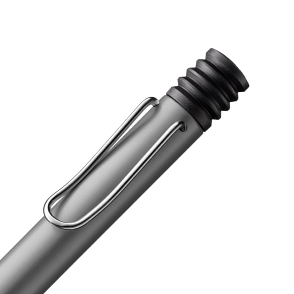 The Lamy AL-Star Ballpoint Pen is the attractive, young writing instrument which satisfies even the highest requirements. Made of feather-light robust aluminium, anodised in various colours. With ergonomic transparent grip and spring-action metal clip. Ballpoint pen comes with LAMY large capacity refill M 16 black. Aluminium, graphite anodized / metal clip / ergonomic plastic grip / with giant refill LAMY M16 M black Part No. 4000914