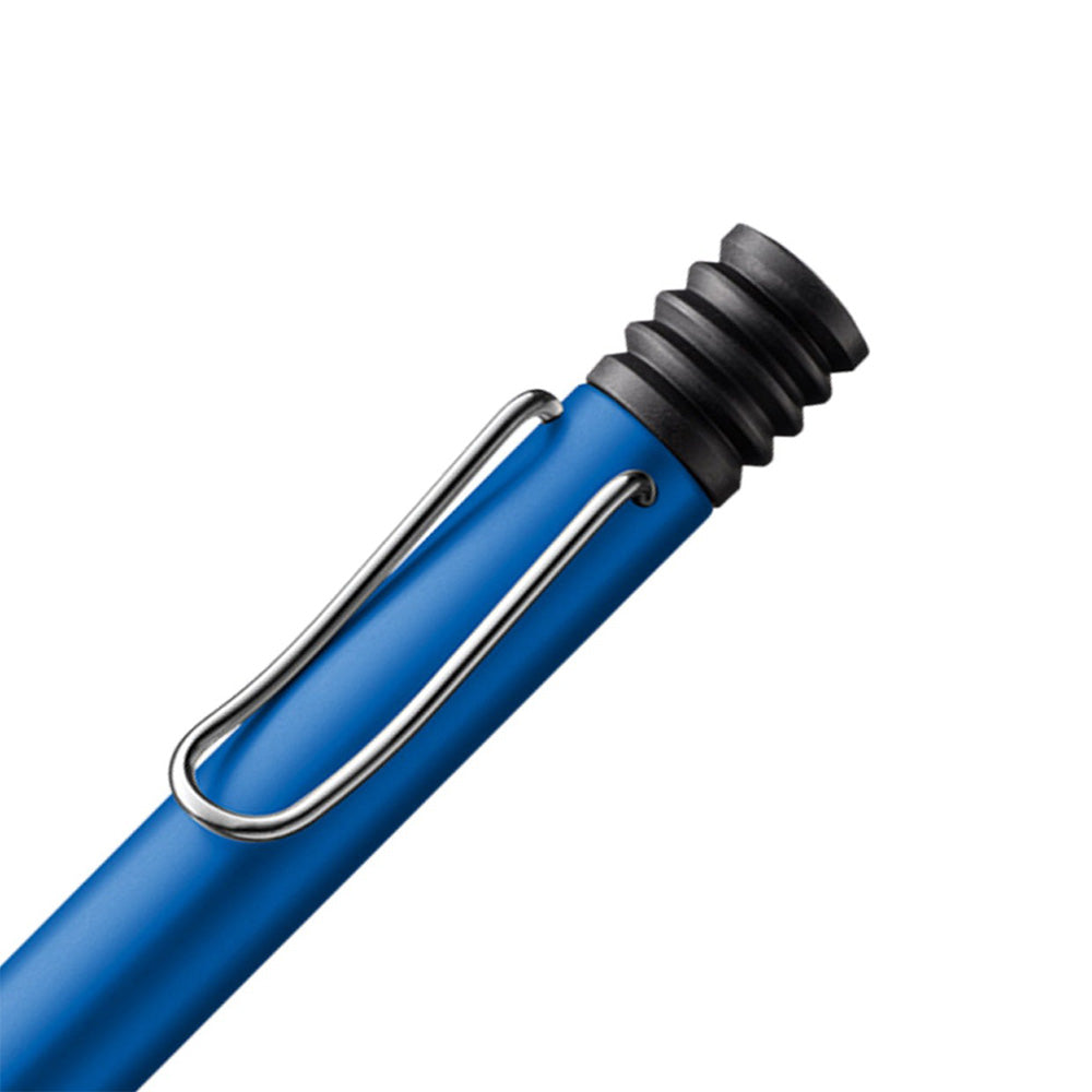 The Lamy AL-Star Ballpoint Pen is the attractive, young writing instrument which satisfies even the highest requirements. Made of feather-light robust aluminium, anodised in various colours. With ergonomic transparent grip and spring-action metal clip. Ballpoint pen comes with LAMY large capacity refill M 16 black. Aluminium, dark blue anodized / metal clip / ergonomic plastic grip / with giant refill LAMY M16 M black Part No. 4000917