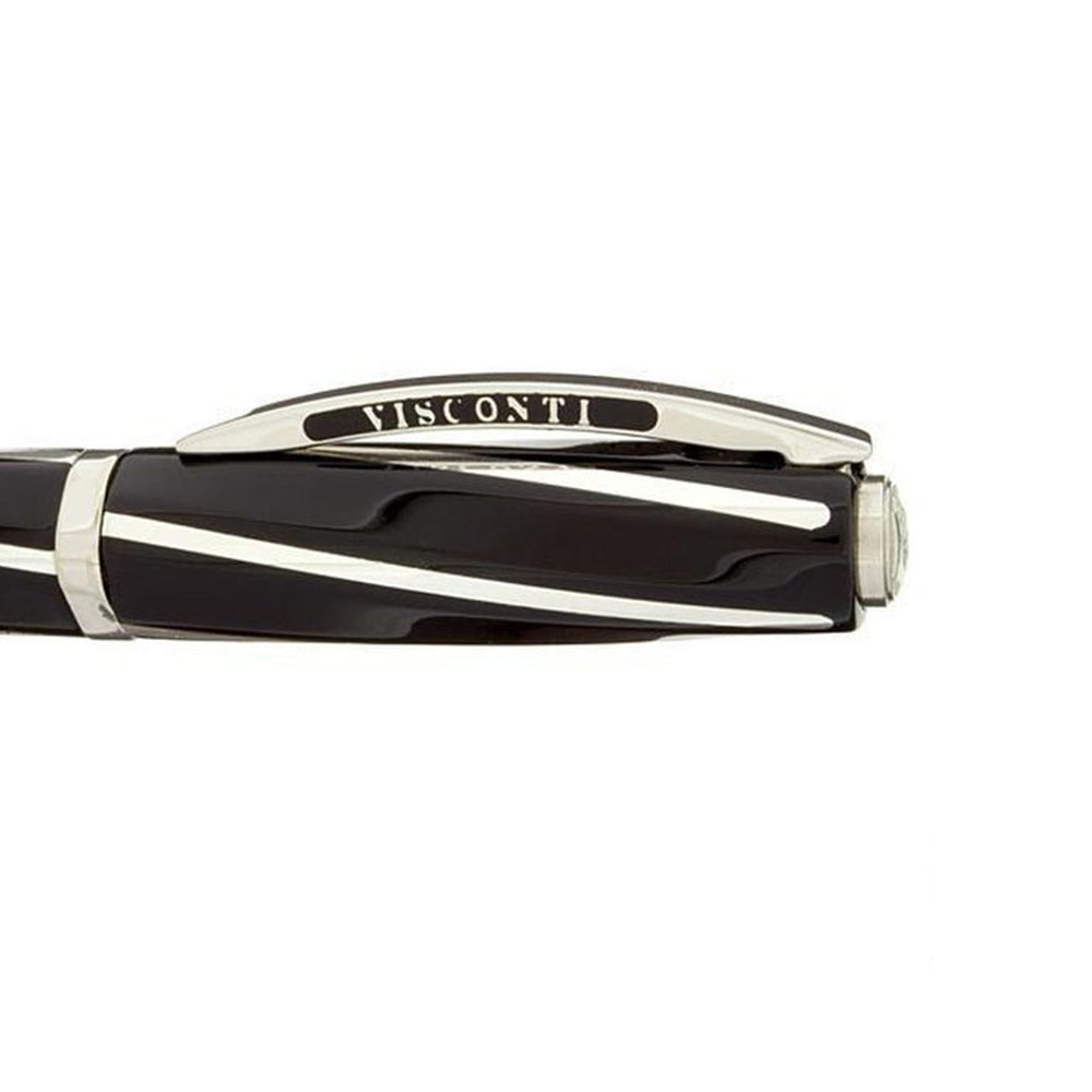 Part of the uniqueness of the Divina Elegance pen comes from its long and meticulous creation process. The Divina Elegance ballpoint pen is adorned with the classic Visconti arched clip and closes with a twist mechanism. The silver inlays are inserted manually one by one while the metal finishes are made of palladium. Colour: Black Material: Acrylic resin Metal fittings: inlaid with silver Ag925 Filling: Refill A38 Closure type: "twist" mechanism Country of Origin : Italy
