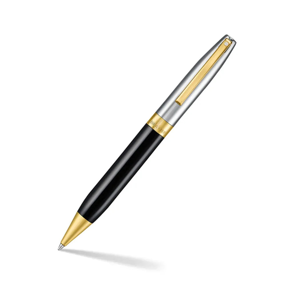 The Sheaffer Legacy Ballpoint Pen blends timeless design with effortless function, crafted for those who believe everyday writing deserves distinction. Accented with stainless steel 14K PVD gold-plated trims, its bold profile, smooth twist mechanism, and perfectly balanced weight bring purpose and poise to every word. A tribute to Sheaffer's legendary craftsmanship, the Legacy Ballpoint is where heritage meets modern ease-signature in every detail, exceptional in every line.