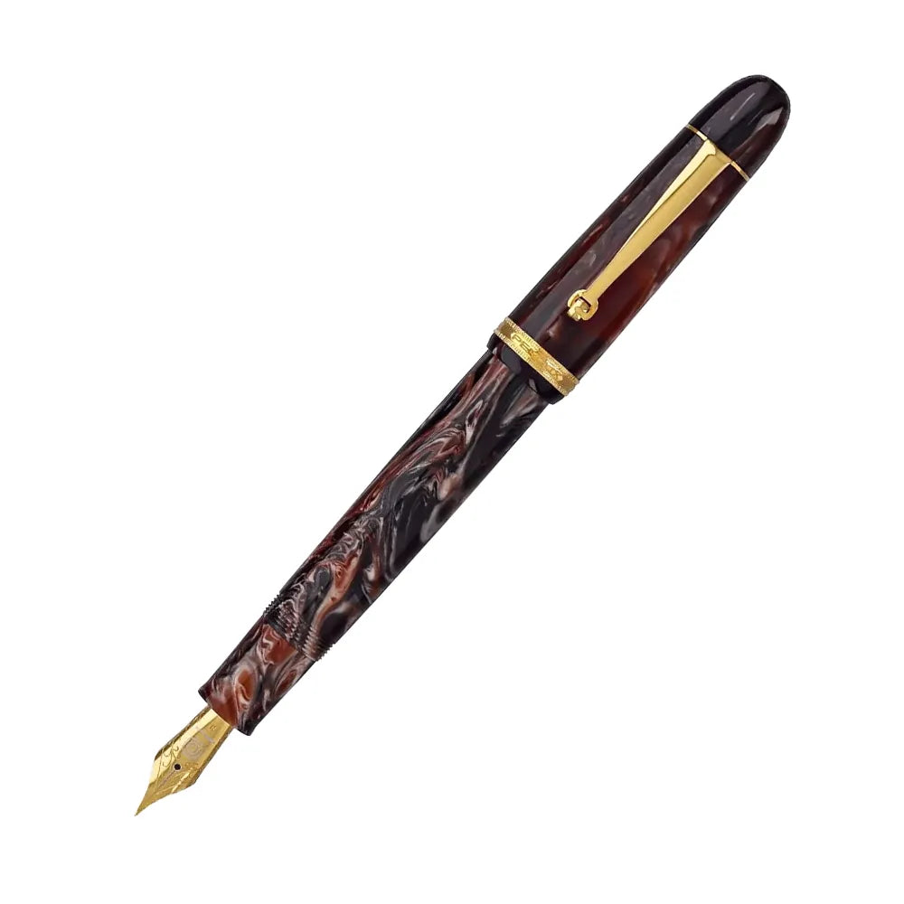 The Penlux Masterpiece Grande fountain pen in Marble Wave features a gorgeous resin body and cap of swirling dark red and black, accented with gold-plated trim. The colors invoke the elegance of a hazy jazz lounge with red velvet booths and black bar stools. The gold-plated stainless steel Jowo nib gives a smooth writing experience, and the oversized body with the piston filling system makes this a terrific value, and a generous pen in your hand.