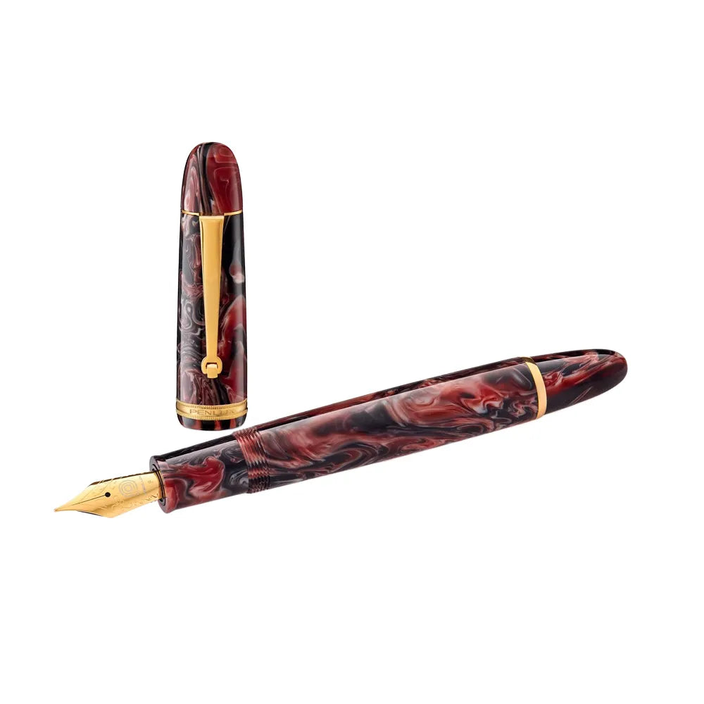 The Penlux Masterpiece Grande fountain pen in Marble Wave features a gorgeous resin body and cap of swirling dark red and black, accented with gold-plated trim. The colors invoke the elegance of a hazy jazz lounge with red velvet booths and black bar stools. The gold-plated stainless steel Jowo nib gives a smooth writing experience, and the oversized body with the piston filling system makes this a terrific value, and a generous pen in your hand.