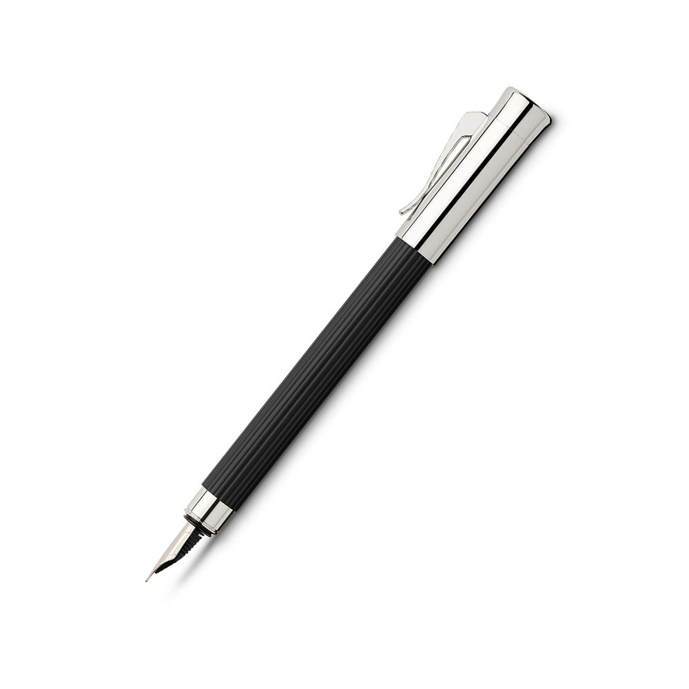Fountain pen Tamitio Black, M Our series „Tamitio“ shows how the culture of writing can be enriched with extraordinary nuances. Each of the slender writing implements is the expression of pure elegance and therefore both, eye-catcher and stylish accessory, together. Matt lacquered metal barrel, finely fluted, Black Chrome-plated, highly polished metal parts Solid, spring-loaded Clip High-quality, rhodium-plated stainless steel nib Cartridge- converter system Converter included Elegant gift box included