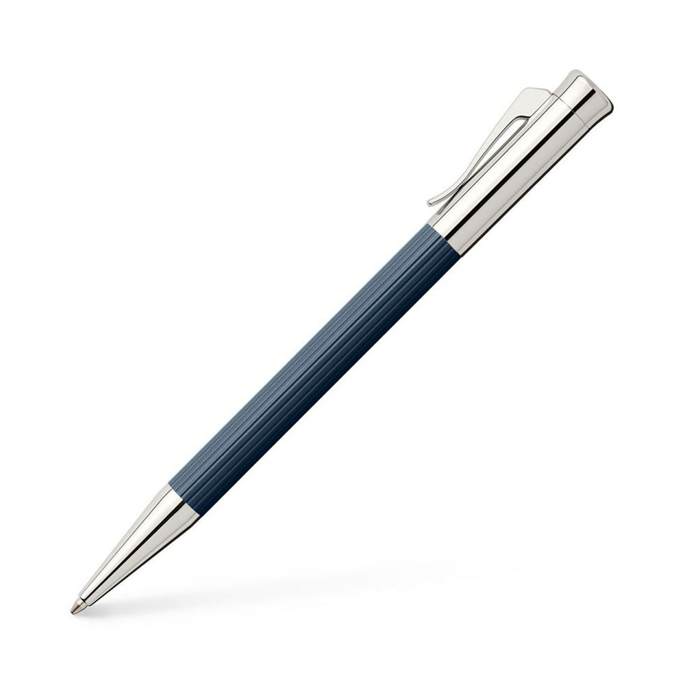 Ballpoint pen Tamitio Night Blue Our series „Tamitio“ shows how the culture of writing can be enriched with extraordinary nuances. Each of the slender writing implements is the expression of pure elegance and therefore both, eye-catcher and stylish accessory, together. Matt lacquered metal barrel, finely fluted, Night Blue Chrome-plated, highly polished metal parts Solid, spring-loaded Clip Black, large capacity refill in international standard size Line width B Document- proof Elegant gift box included