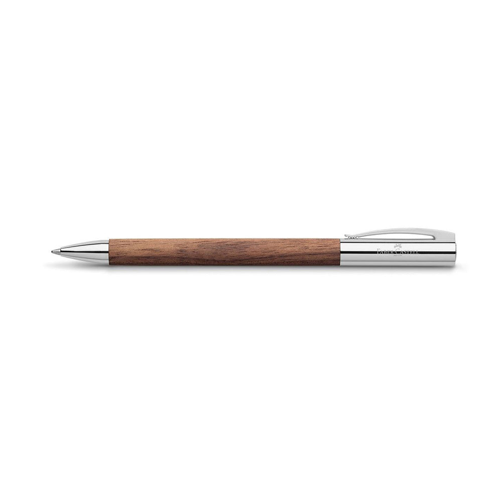 Ambition walnut wood twist ballpoint pen, B, brown The clean lines and selected materials of these slim writing implements make an excellent impression. They are distinguished by clear-cut visual design combined with professional functionalism. Barrel made of walnut wood End cap and tip made of chrome-plated polished metal Spring-loaded clip made of chrome-plated polished metal Equipped with twist mechanism Fitted with a black large-capacity refill Line width B Country of Origin : Germany 