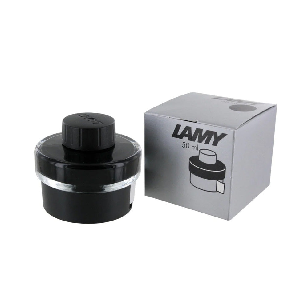 LAMY T52 bottled ink, 50ml, comes with an in-built roll of blotting paper around the base and ink residue collecting basin for effortless and mess-free refilling of your fountain pen. Available in a variety of colours and specifically engineered to suit LAMY fountain pens. Body Material : Glass/Plastic Cap Material : Plastic Ink Capacity : 50 ml Ink Colour : Black Product Type : Writing Instruments Collection : T52 Brand Origin: Germany