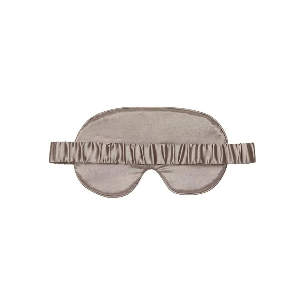 As smooth as silk, this sleep mask is a pleasure to wear. It’s gently cushioned with an elasticated headband for a really comfortable fit. Whether travelling on a brightly lit plane or relaxing in a hotel bedroom, this pretty sleeping mask blocks even harsh light. Luxury silky eye mask Effectively blocks out unwanted light Gently padded with a fleecy lining Promotes sound sleep, anywhere Elasticated headband for a comfortable fit 100% Light Blocking - Soft lining to prevent disturbing light