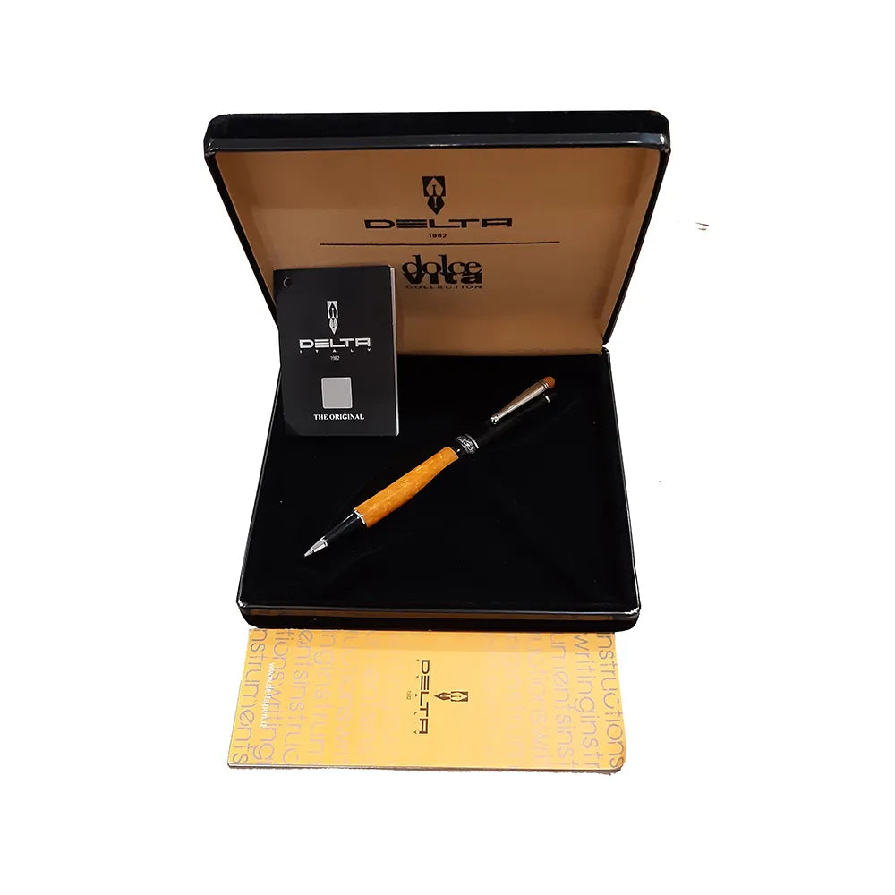 The Delta Lucky We Mechanical Pencil is designed with a “We” integrated into the cap of the pen for luck. The cap and barrel are hand turned in black and orange resins. Unforgettable Ballpoint pen from the handmade collection. Black/Orange Resign with 925% Sterling Silver Trim Twist-action ballpoint pen Filling System : 0.7mm Lead hand-made, hand-turned Terracotta Orange and Solid Black resin Made In Italy