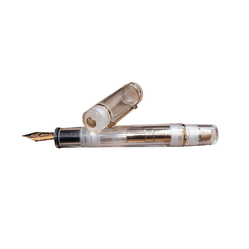 Delta Dolcevita IT Mid-Size Transparent Resin with Gold Trim Fountain Pen - 14Kt Gold Broad Nib