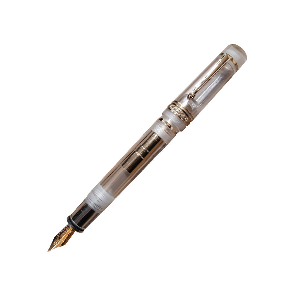 Delta Dolcevita IT Mid-Size Transparent Resin with Gold Trim Fountain Pen - 14Kt Gold Broad Nib