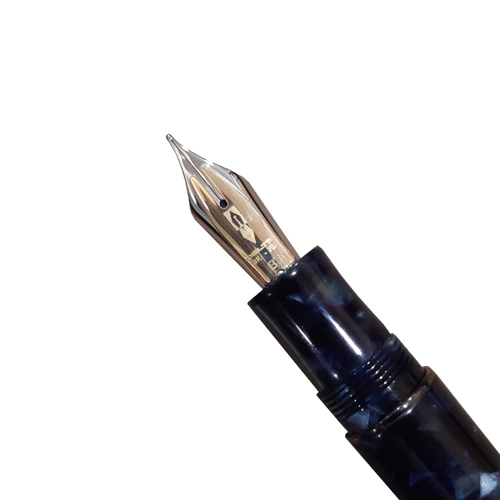 Delta The Journal Marbled Blue Resin with Gunmetal Trim Fountain Pen – 18Kt Gold Fusion Broad Nib