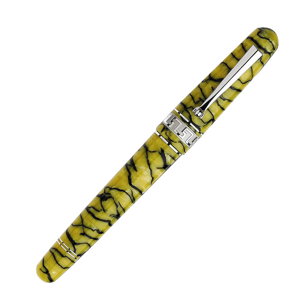 The new Rediscover Pompei, made in “Pompeian yellow” celluloid, interlaced with antiquing streaks, comes in two versions. This version fills with a cartridge/converter, and is the mid-size. The central ring offers a carved representation of the greek key design, crafted from Sterling Silver. Body Color: Yellow (solid sterling silver enriched and plated with rhodium) Ink Color: Blue Material : Celluloid Nib Material: 14Kt gold Fill Mechanism: cartridge/converter filling system Personalized wooden box