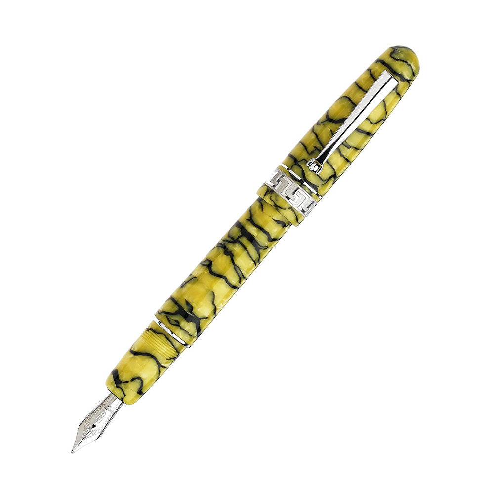 The new Rediscover Pompei, made in “Pompeian yellow” celluloid, interlaced with antiquing streaks, comes in two versions. This version fills with a cartridge/converter, and is the mid-size. The central ring offers a carved representation of the greek key design, crafted from Sterling Silver. Body Color: Yellow (solid sterling silver enriched and plated with rhodium) Ink Color: Blue Material : Celluloid Nib Material: 14Kt gold Fill Mechanism: cartridge/converter filling system Personalized wooden box