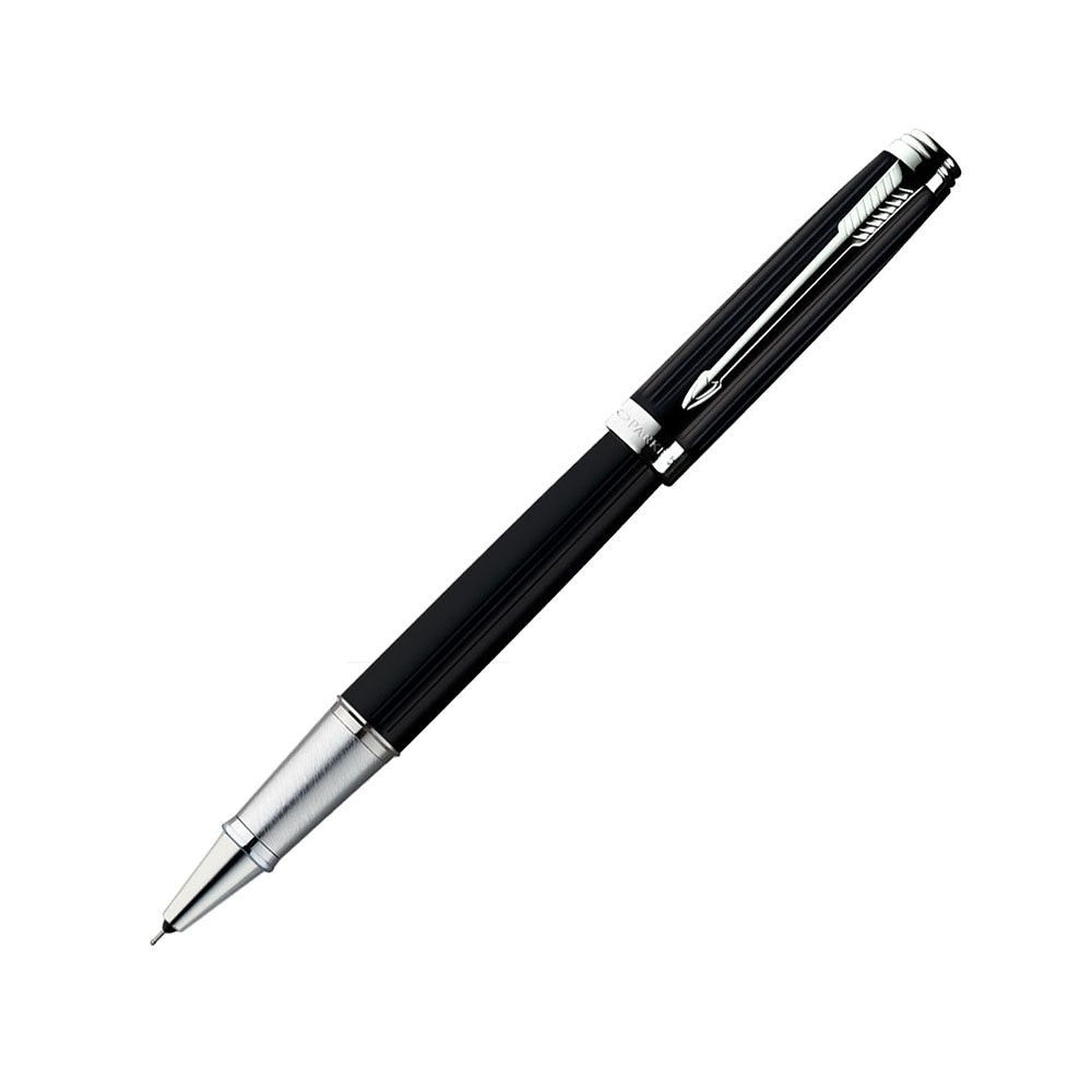All-Over Black Lacquered Cap And Barrel With Brushed Metal Grip, Highlighted By Chrome Plated Trim. Fitted With Stainless Steel Nib. Cap On/Cap Off Supplied With Standard/Ultra Fine Navigator Roller Ball Refill. Finish: Black Lacquered  Trim : Chrome Plated Trim Body Material: Powder Coating Stainless Steel Closure : Cap on Cap off Ink Colour : Blue Nib Features: Ultra Fine Navigator 1N Black Wallet Free inside the box Attractive Packing for Gift.