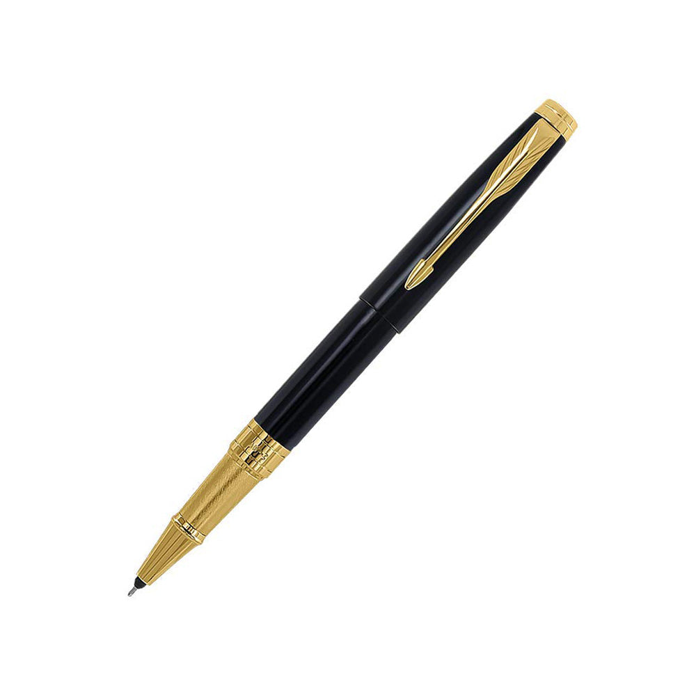 Parker Aster Roller Ball Pen With Lacquer Black Finish Metal Barrel And Gold Plated Trim. A Contemporary & Unique Design Blended Highlighted With A Gold Plated Ring On The Barrel. Lacquer Black Finish Metal Barrel Gold Plated Trim A Contemporary & Unique Design Gold Plated Ring On The Barrel 1N Rollerball Pen + 1N Pocket Watch (Free) Made in India