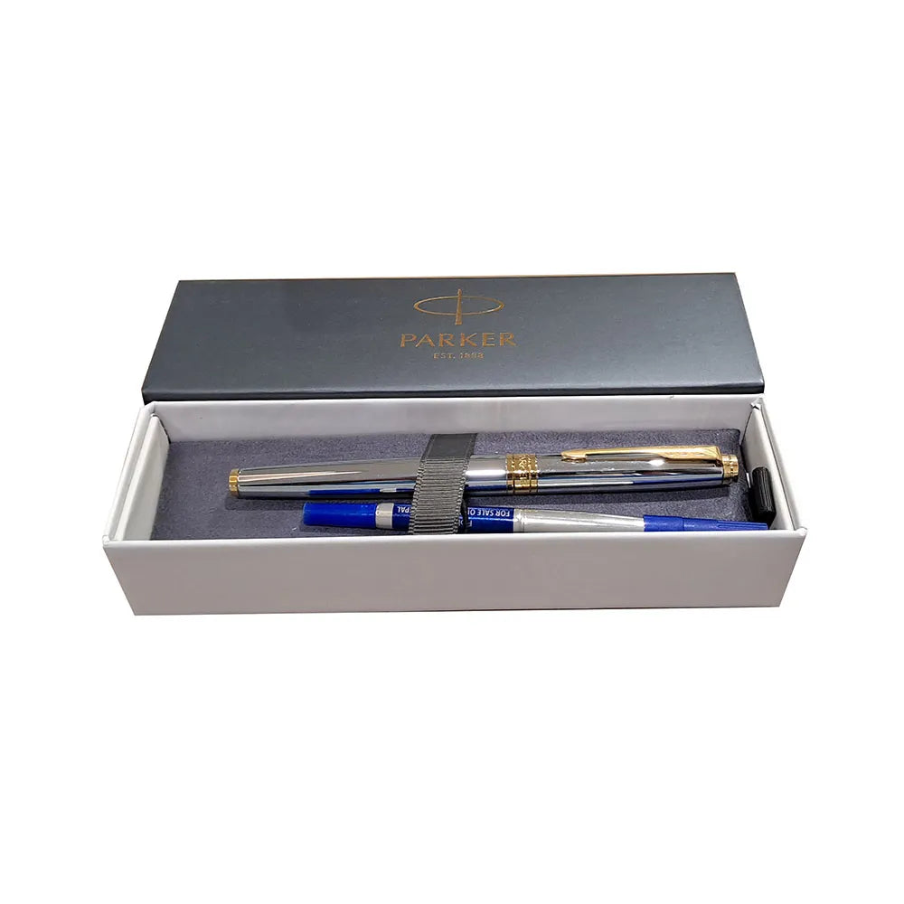 Parker Aster Shiny Chrome GT Rollerball Pen Parker Aster Roller Ball Pen With Lacquer Black Finish Metal Barrel And Gold Plated Trim. A Contemporary & Unique Design Blended Highlighted With A Gold Plated Ring On The Barrel. Roller Ball Pen With Shiny Chrome Finish Metal Barrel Gold Plated Trim Modern, Elegant And Professional. Stylish Roller Ball Pen Slim Grip Made in India