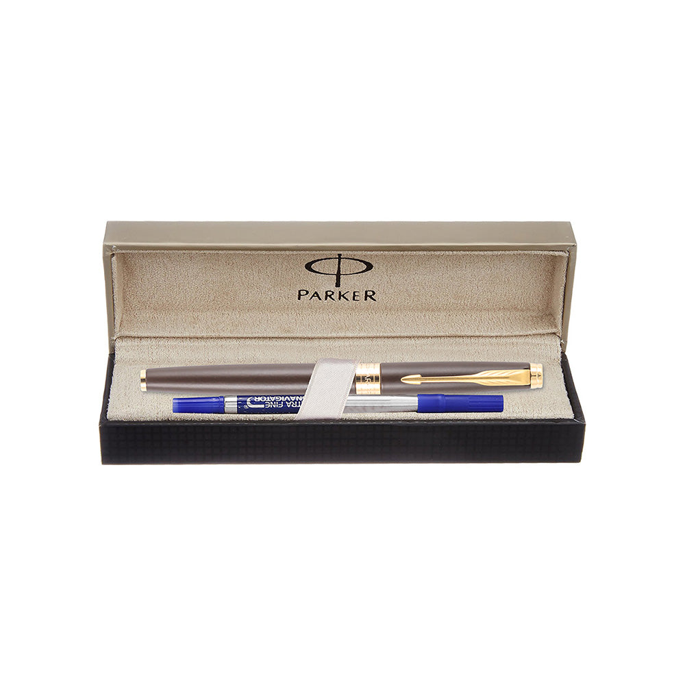 Parker Aster Lacque Brown GT Rollerball Pen, Parker Aster Roller Ball Pen With Lacquer Brown Finish Metal Barrel And Gold Plated Trim. A Contemporary & Unique Design Blended Highlighted With A Gold Plated Ring On The Barrel. Roller Ball Pen With Lacquer Brown Finish Metal Barrel Gold Plated Trim A Contemporary & Unique Design Gold Plated Ring On The Barrel Made in India