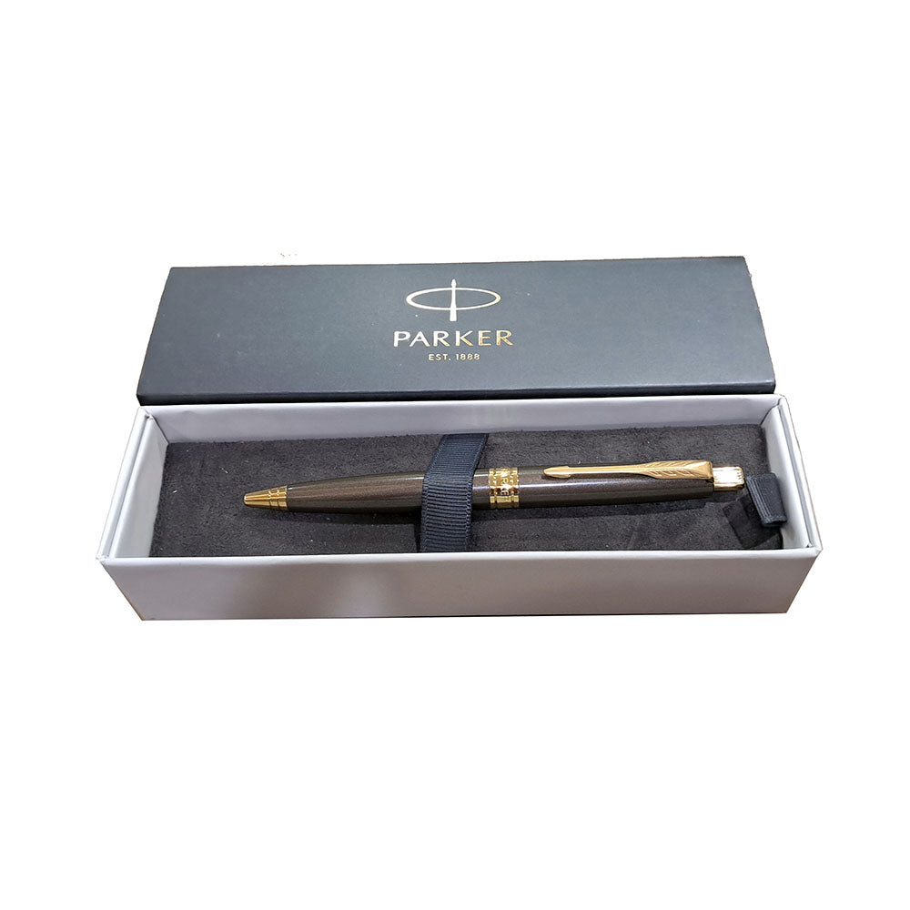 Parker Aster Lacque Brown Gold Trim Ballpoint Pen, Parker Aster Ball Pen With Lacquer Brown Finish Metal Barrel And Gold Plated Trim. A Contemporary & Unique Design Blended Highlighted With A Gold Plated Ring On The Barrel. Ball Pen With Lacquer Brown Finish Metal Barrel Gold Plated Trim A Contemporary & Unique Design Gold Plated Ring On The Barrel Made in India