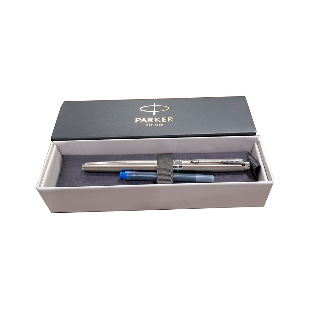 Parker Aster Fountain Pen With Brushed Metal Finish Brushed Metal Barrel And Chrome Plated Trim. A Contemporary & Unique Design Blended Highlighted With A Chrome Plated Ring On The Barrel. Body Colour : Brushed Metal Chrome Plated trim for premium look Pen opening mechanism: Cap off/ cap on Stainless Steel Medium Nib A contemporary and unique design blended highlighted with a chrome plated ring on the barrel Country of Origin: India
