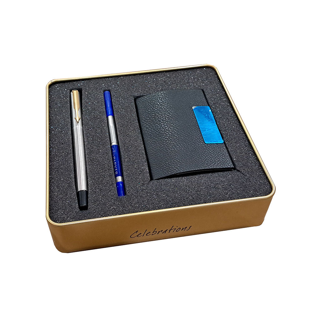 Parker Vector Stainless Steel GT Rollerball Pen with Card Holder (Free) Smooth stainless steel cap and barrel with Gold plated clip. Full steel body for extra durability. Supplied with standard roller ball refill with Ultrafine Navigator technology. Stainless Steel with Gold Plated Trim & Clip Body Material: Steel Cap on/off Executive leather finish visiting card holder. Easy and convenient to hold even the double type business cards. Free Card Holder inside Pack Tin Box Packing Made in India