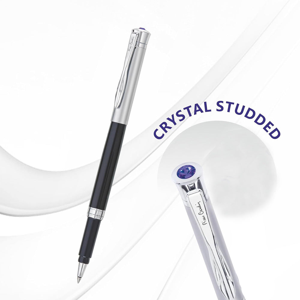 Diamond Crowned Type Designed With Royal Look One Of The Collective Models Ever Made Dance Roller Pen Is Blend Of Black Lacquer Finish And Satin Silver Components. Roller Pen Fitted With 666 Roller Refill So That Your Handwriting Will Look Neat And Legible. Black lacquer finish with Silver Trims Sleek body design  Metal body Blue Stone studded top for added beauty Snap On Roller pen fitted with 666 roller refill Blister Pack