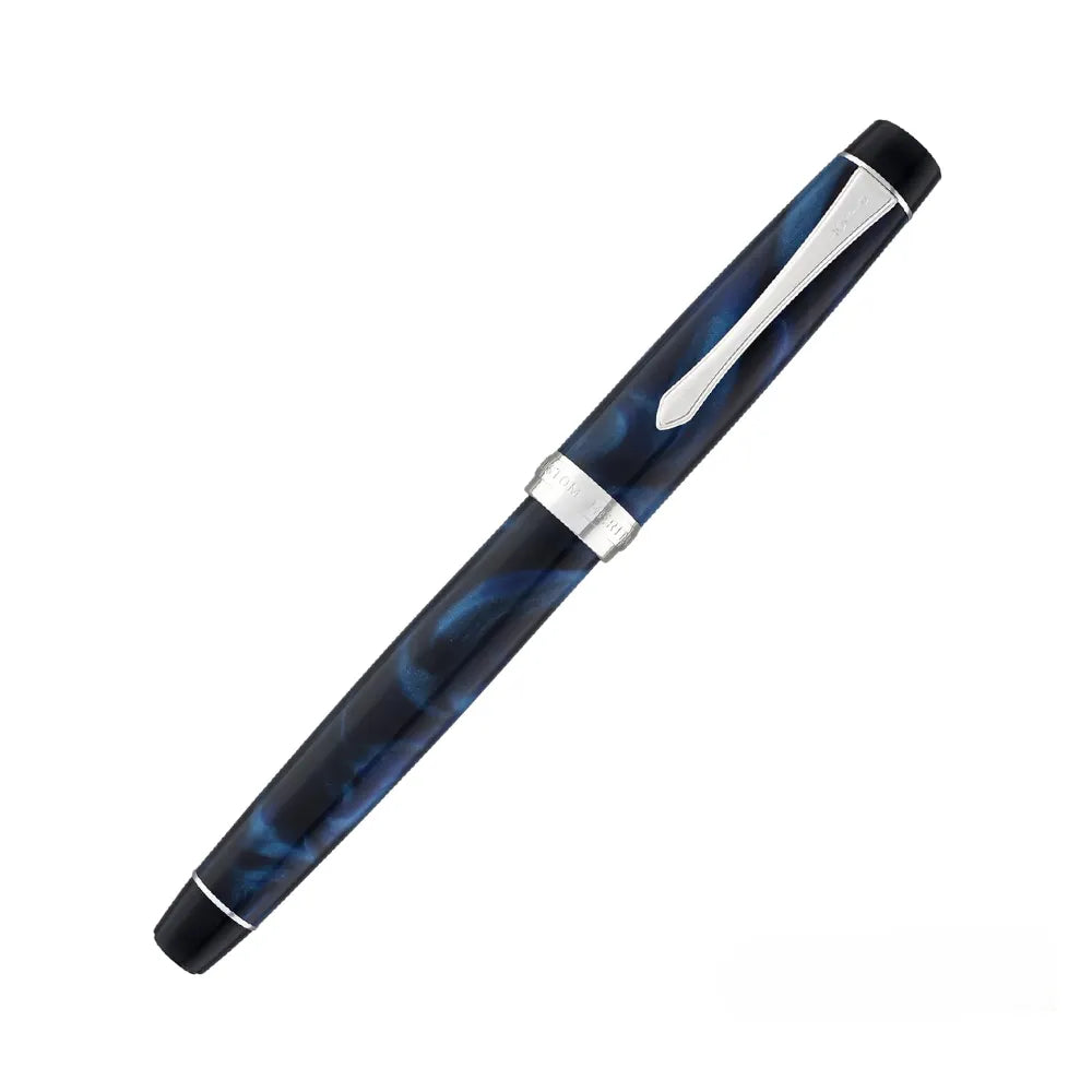 The Pilot Custom Heritage SE Marble Blue CT Fountain Pen is a stunning and vibrant marble-colored resin body extends sophistication to your writing style. Every single pen is one-of-a-kind, because no two marbling patterns are exactly the same. The Pilot Custom Heritage SE fountain pen is smooth writing with a finely crafted 14 karat gold, #5, rhodium plated nib, available in Fine or Medium. Designed to delight the fountain pen collector, the pen’s exceptional body is enhanced with lustrous rhodium accents.