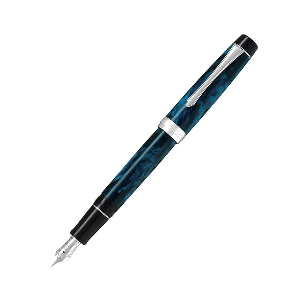 The Pilot Custom Heritage SE Marble Blue CT Fountain Pen is a stunning and vibrant marble-colored resin body extends sophistication to your writing style. Every single pen is one-of-a-kind, because no two marbling patterns are exactly the same. The Pilot Custom Heritage SE fountain pen is smooth writing with a finely crafted 14 karat gold, #5, rhodium plated nib, available in Fine or Medium. Designed to delight the fountain pen collector, the pen’s exceptional body is enhanced with lustrous rhodium accents.
