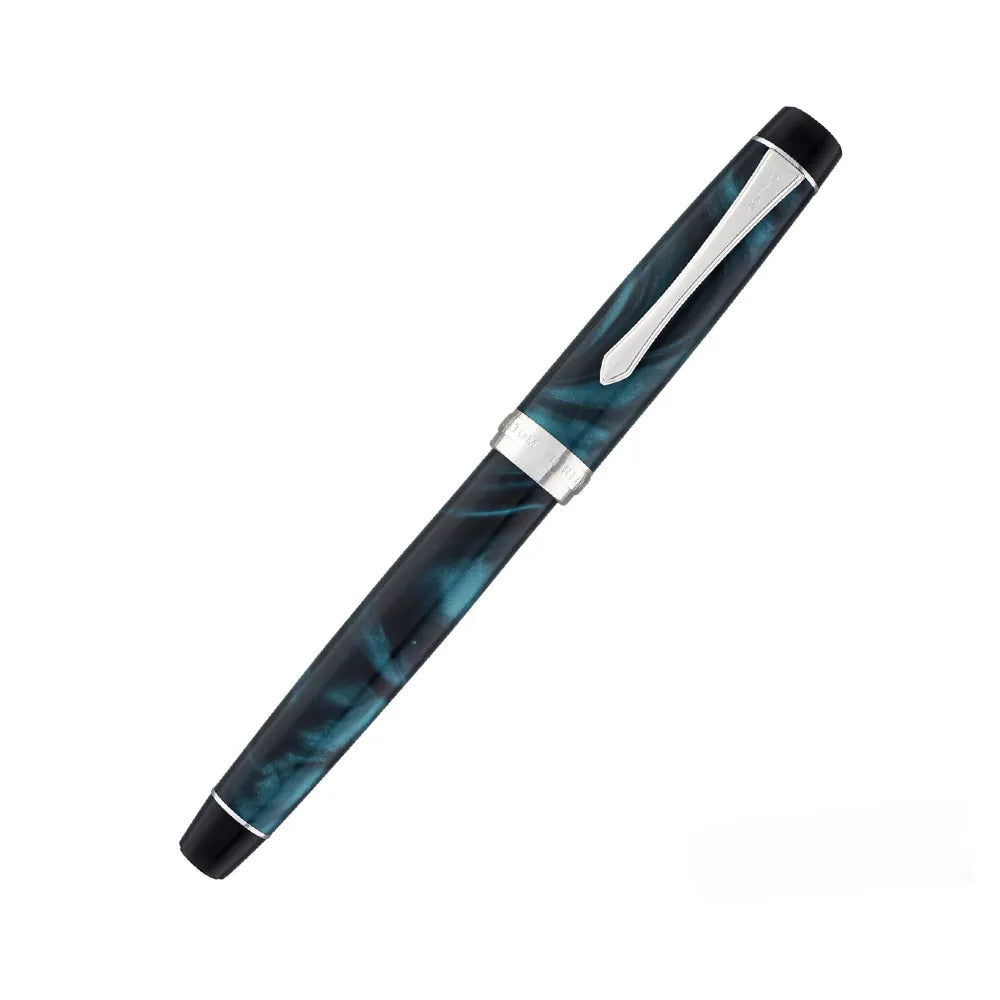 The Pilot Custom Heritage Marble SE Green Fountain Pen is a stunning and vibrant marble-colored resin body extends sophistication to your writing style. Every single pen is one-of-a-kind, because no two marbling patterns are exactly the same. The Pilot Custom Heritage SE fountain pen is smooth writing with a finely crafted 14 karat gold, #5, rhodium plated nib, available in Fine or Medium. Designed to delight the fountain pen collector, the pen’s exceptional body is enhanced with lustrous rhodium accents. T