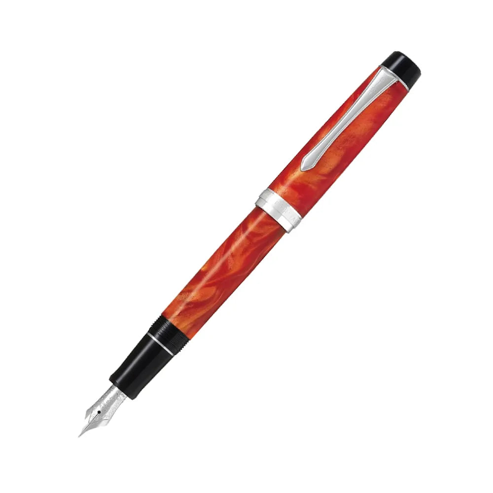 The Pilot Custom Heritage Marble SE Orange Fountain Pen is a stunning and vibrant marble-colored resin body extends sophistication to your writing style. Every single pen is one-of-a-kind, because no two marbling patterns are exactly the same. The Pilot Custom Heritage SE fountain pen is smooth writing with a finely crafted 14 karat gold, #5, rhodium plated nib, available in Fine or Medium. Designed to delight the fountain pen collector, the pen’s exceptional body is enhanced with lustrous rhodium accents. 