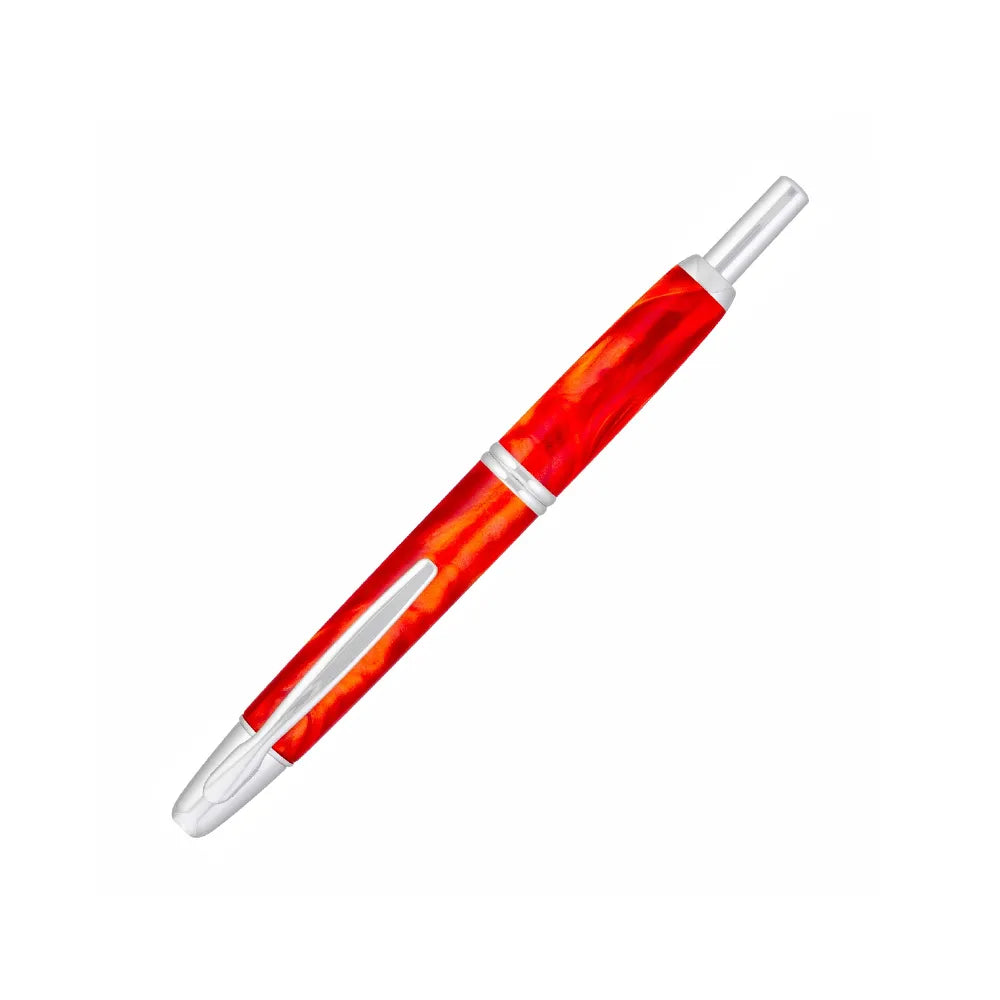 The Pilot Capless Marble Orange Fountain Pen stunning and vibrant marble-colored Orange resin body extends sophistication to your writing style. Every single pen is one-of-a-kind because no two marbling patterns are the same. Designed to delight the fountain pen collector, the pen’s exceptional body is enhanced with lustrous rhodium accents. The Capless fountain pen by Pilot is the world’s first and favorite retractable fountain pen. The Vanishing Point was revolutionary when it was engineered in 1963 and c