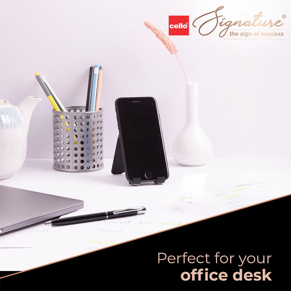 Proudly presenting finely handcrafted textured Signature Optima Ball Pen with twist mechanism and premium German Ink along with Metal mobile stand, which is perfect for an office desk. The Cello Signature Supreme Gift set is inclusive of metallic Carbon slim ball pen and a hardbound A5 notebook. Premium Metal Slim Mobile stand with Optima (Black and silver look) Metal Ball Pen Premium Gift box ideal for gifting Twist Mechanism Metal Pen 0.7mm Tip for fine writing