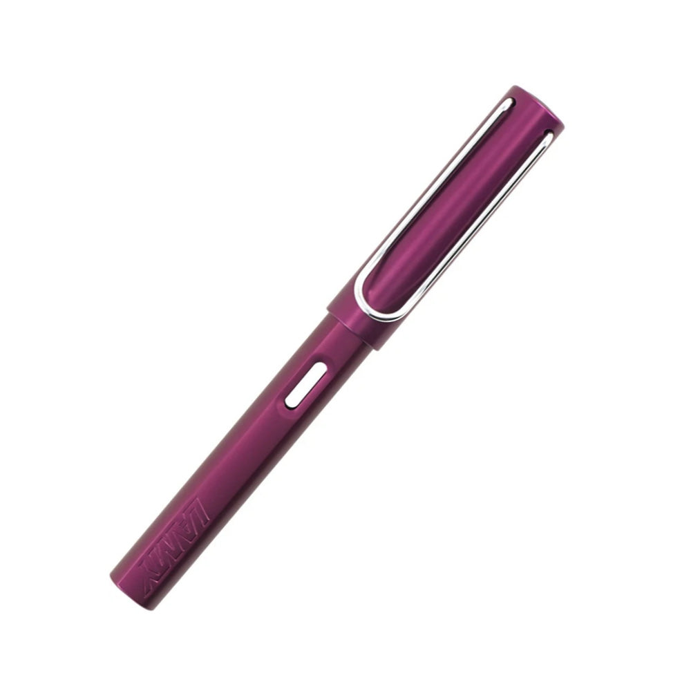 LAMY AL-star black purple Fountain pen F The Lamy AL-star is the attractive, young writing instrument which satisfies even the highest requirements. Made of feather-light robust aluminium, anodised in various colours. With distinctive transparent grip and spring-action metal clip. Aluminium, dark purple metallic anodized / metal clip / ergonomic plastic grip / steel nib, polished / with ink cartridge LAMY T 10 blue /with converter Z28