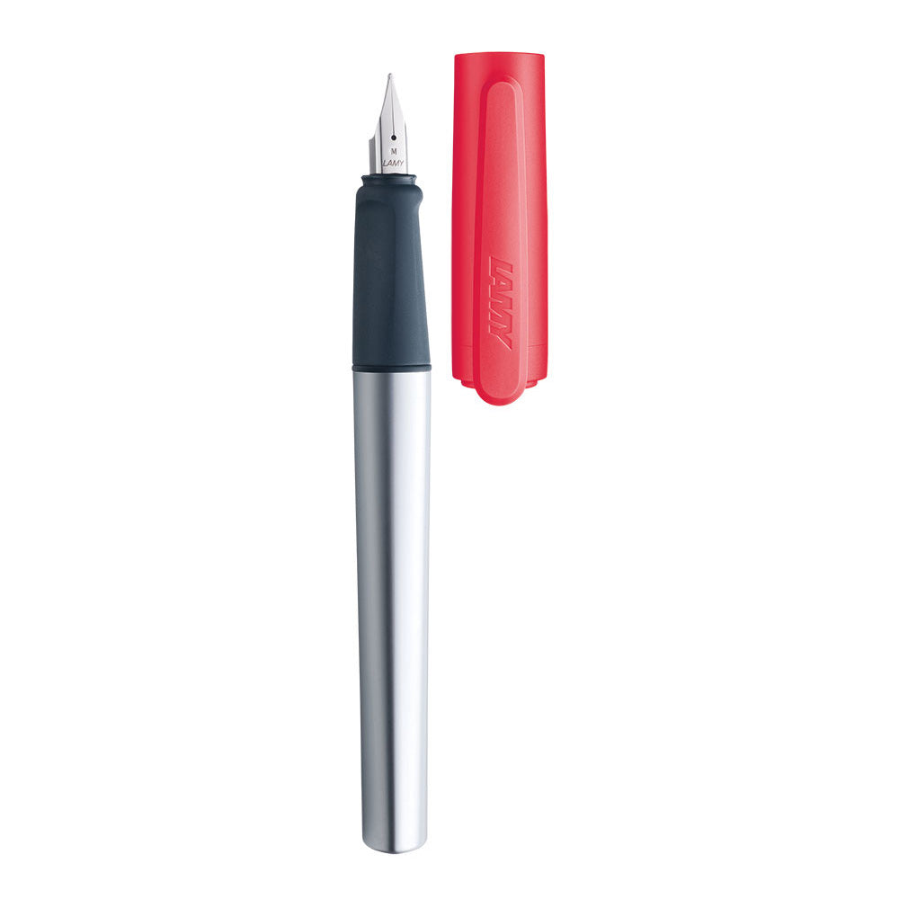 LAMY nexx crimson Fountain pen M The LAMY nexx fountain pen has a soft non-slip grip which makes for extended fatigue-free writing. Light and exceptionally sturdy aluminium body and plastic cap. Aluminium, naturally anodized / cap: plastic, crimson / non-slip grip / steel nib, polished / with ink cartridge LAMY T 10 blue / comes with the converter LAMY Z 28.