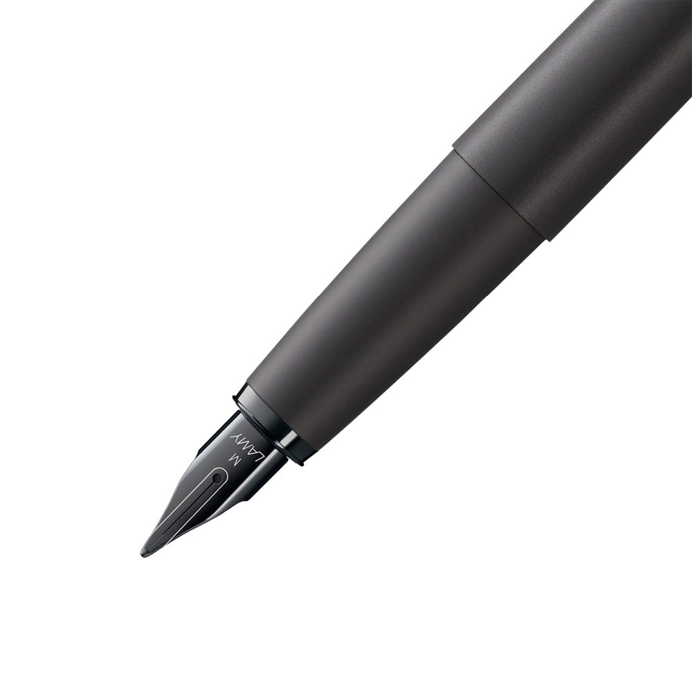 The LAMY Studio Lx All-black is the latest iteration of this elegant pen, this time with fine distinct touches that make this "All-black" pen extraordinarily luxurious -- from the special PVD coatings of metal parts to the distinctive Lx-style nib that provides an exceptionally smooth writing experience.   Matt black lacquer finish with steel propeller-shaped clip with PVD coated, polished steel nib PVD coated. With LAMY T 10 blue ink cartridge; suitable for converter LAMY Z 27.
