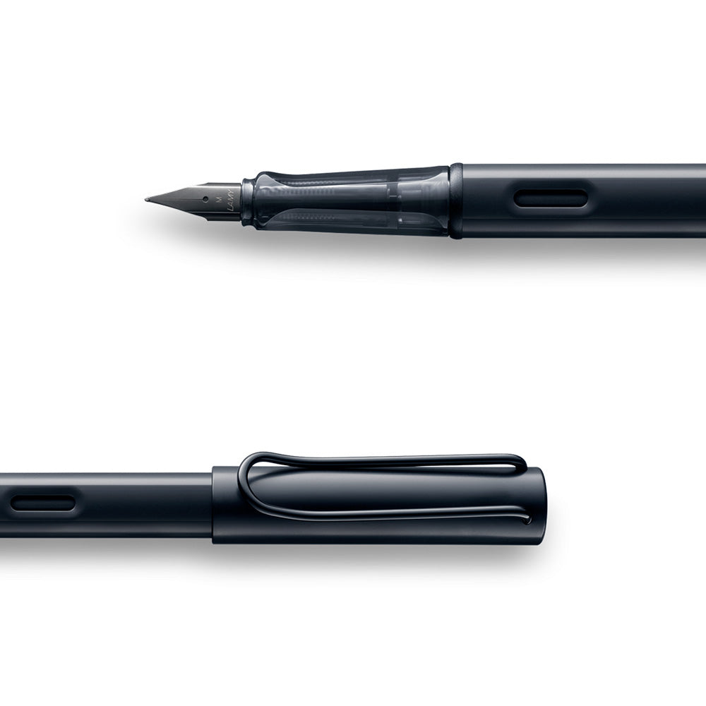 The Light Aluminium-Experience. LAMY AL-star black Fountain pen M The Lamy AL-star is the attractive, young writing instrument which satisfies even the highest requirements. Made of feather-light robust aluminum, anodized in various colors. With distinctive transparent grip and spring-action metal clip. Aluminium, matt black metallic anodized / metal clip / ergonomic plastic grip / steel nib, black / with ink cartridge LAMY T 10 blue / with converter Z 28
