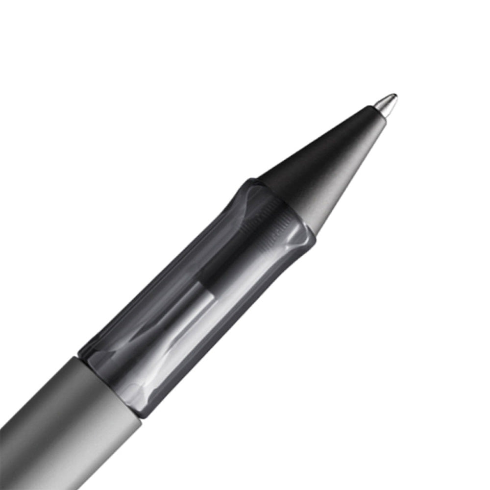 The Lamy AL-Star Ballpoint Pen is the attractive, young writing instrument which satisfies even the highest requirements. Made of feather-light robust aluminium, anodised in various colours. With ergonomic transparent grip and spring-action metal clip. Ballpoint pen comes with LAMY large capacity refill M 16 black. Aluminium, graphite anodized / metal clip / ergonomic plastic grip / with giant refill LAMY M16 M black Part No. 4000914