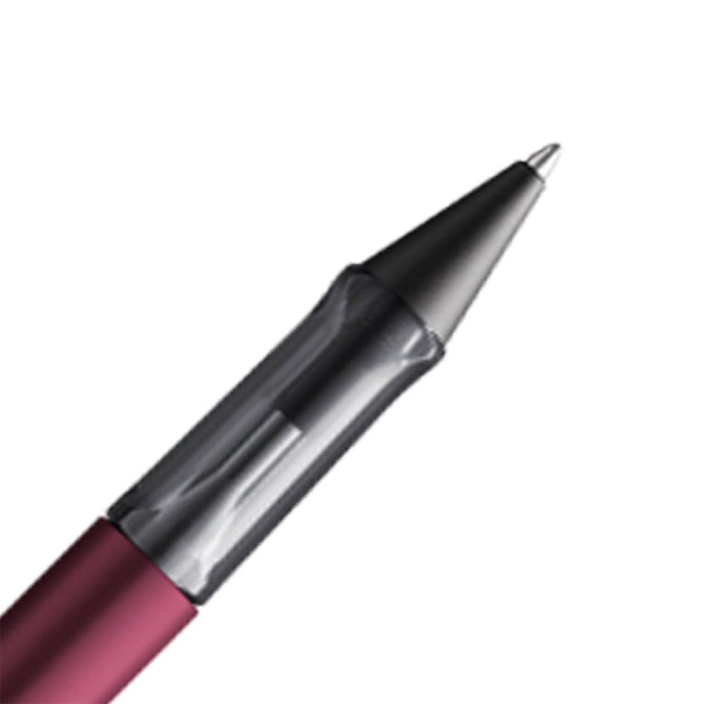 The Lamy AL-Star Ballpoint Pen is the attractive, young writing instrument which satisfies even the highest requirements. Made of feather-light robust aluminium, anodised in various colours. With ergonomic transparent grip and spring-action metal clip. Ballpoint pen comes with LAMY large capacity refill M 16 black. Aluminium, dark purple metallic anodized / metal clip / ergonomic plastic grip / with giant refill LAMY M16 M black Part No. 4000920
