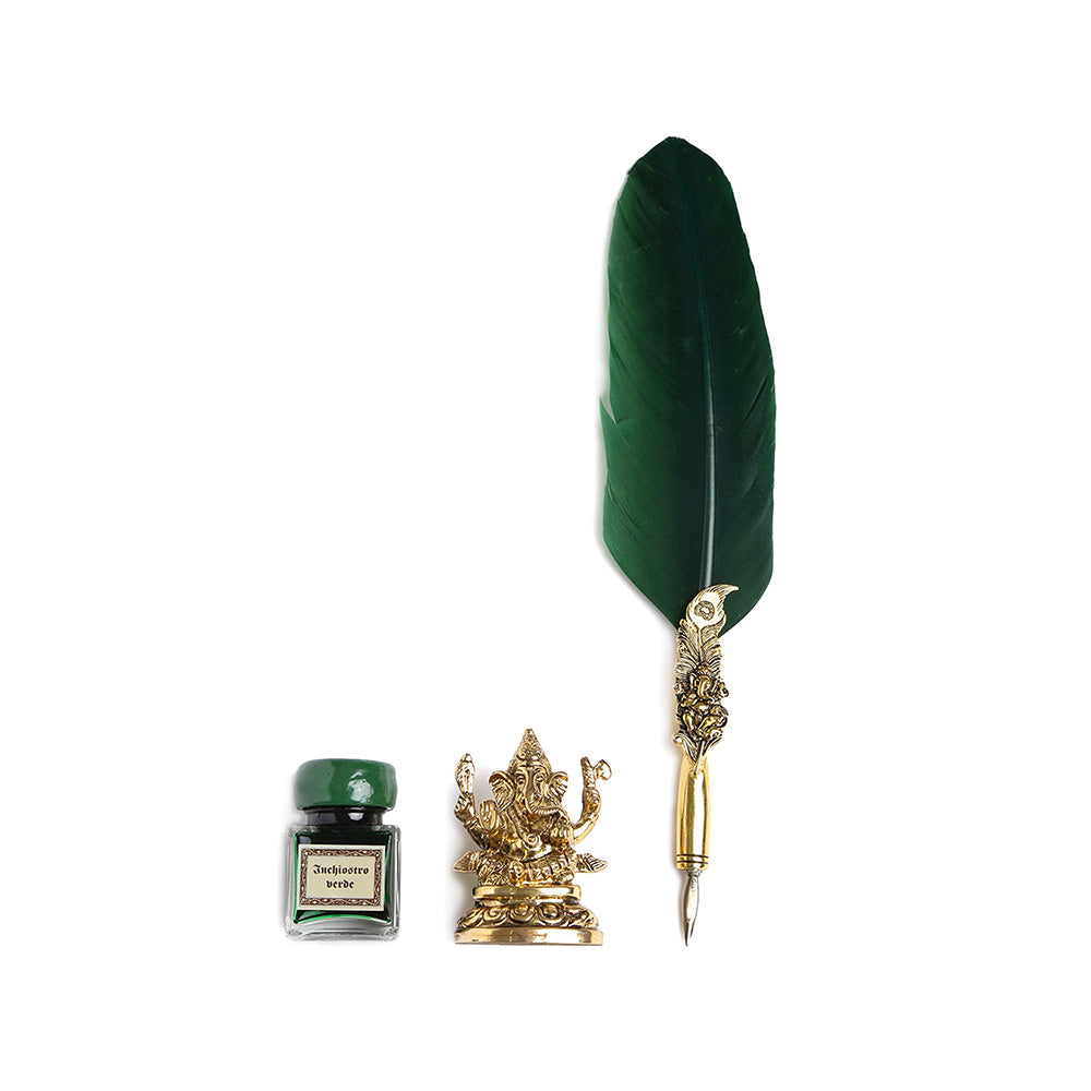 Exclusive to India, the Rubinato Ganesha Quill Pen appeals to those who seek the blessings of the most loved Hindu God. Complete with a Ganesha figurine pen stand, this quill set will be treasured for a lifetime. Green and gold-toned feather Ganesha fountain pen Green inkpot Gold-toned Ganesha pen stand A scroll Nib Material: Stainless Steel Product Material: Metal Handle With Care Brand origin: Italy