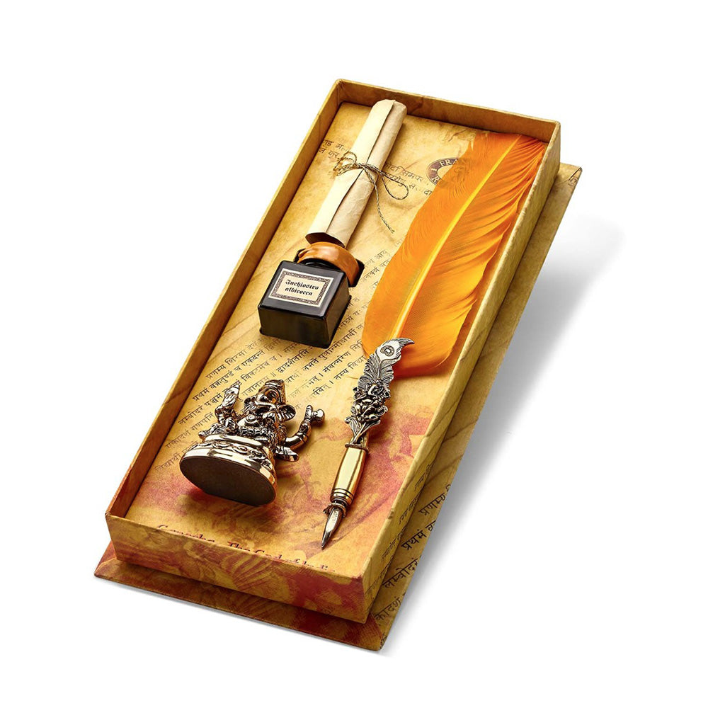 Exclusive to India, the Rubinato Ganesha Quill Pen appeals to those who seek the blessings of the most loved Hindu God. Complete with a Ganesha figurine pen stand, this quill set will be treasured for a lifetime. Orange and gold-toned feather Ganesha fountain pen Orange inkpot Gold-toned Ganesha pen stand A scroll Nib Material: Stainless Steel Product Material: Metal Handle With Care Brand origin: Italy